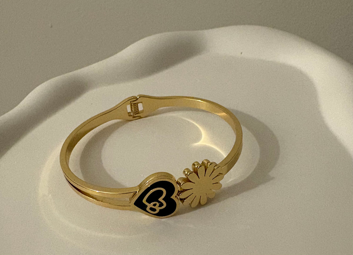 Black Heart & Floral Gold-Tone Bracelet – Elegant Open Bangle